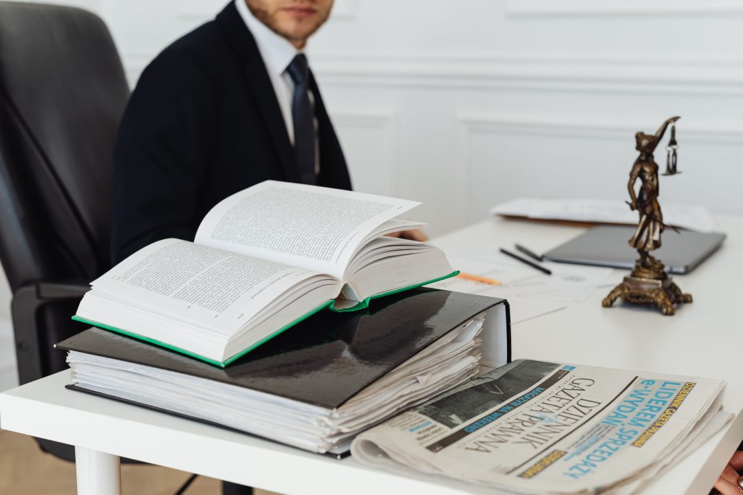 A local attorney’s desk with legal documents.